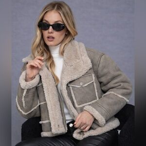 112. Brown mixed fabric coat with Sherpa lining buttons and pocket faux leather